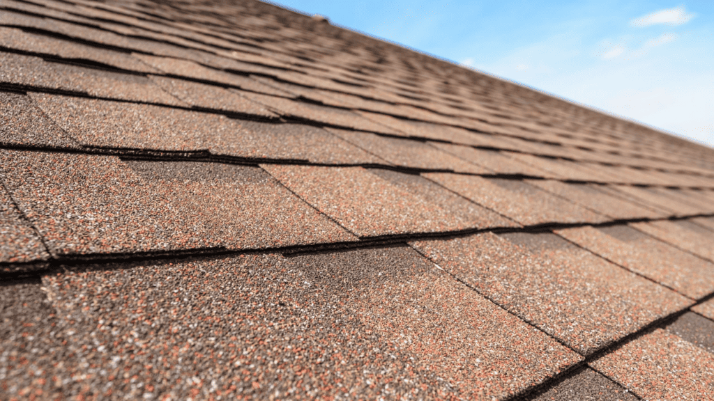 a modern house with a shingle roofing