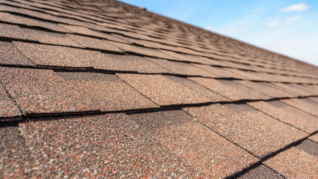 a modern house with a shingle roofing